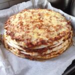 Bolognese and baked bean stack