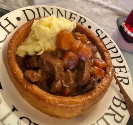 Beef Stew/ Casserole with mash in a giant Yorkshire pudding